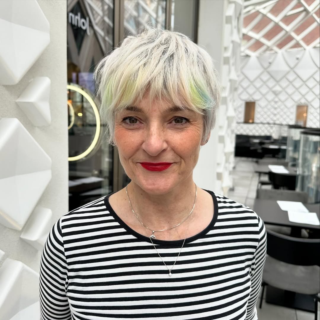 bixie haircut with pastel highlights