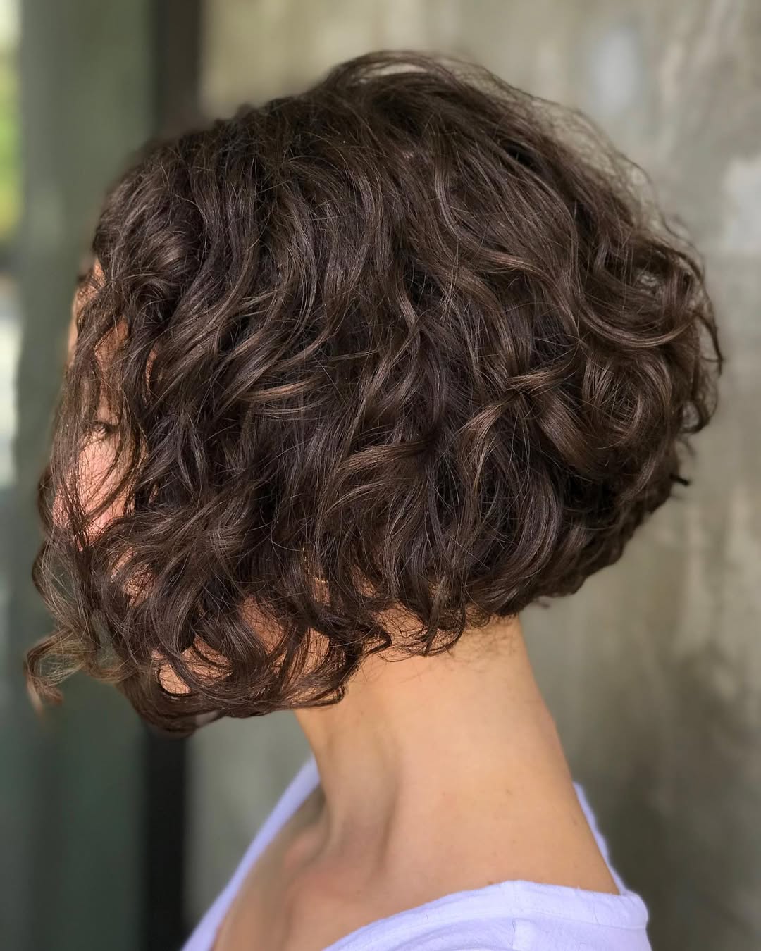curly angled bob haircut