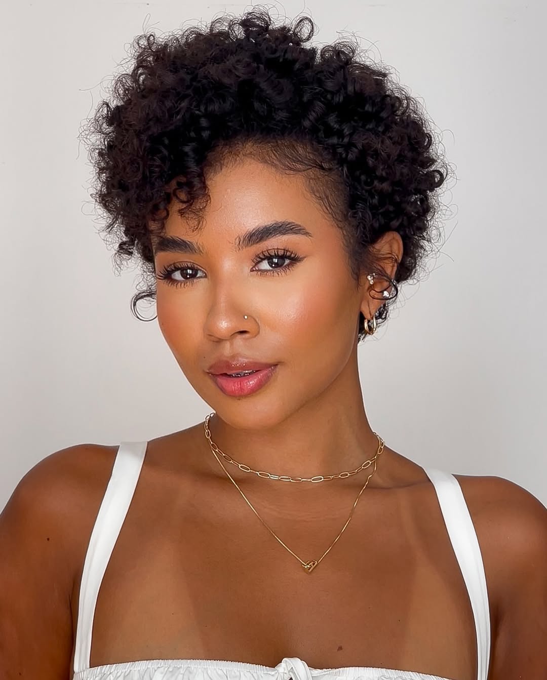 curly pixie bob with side bangs
