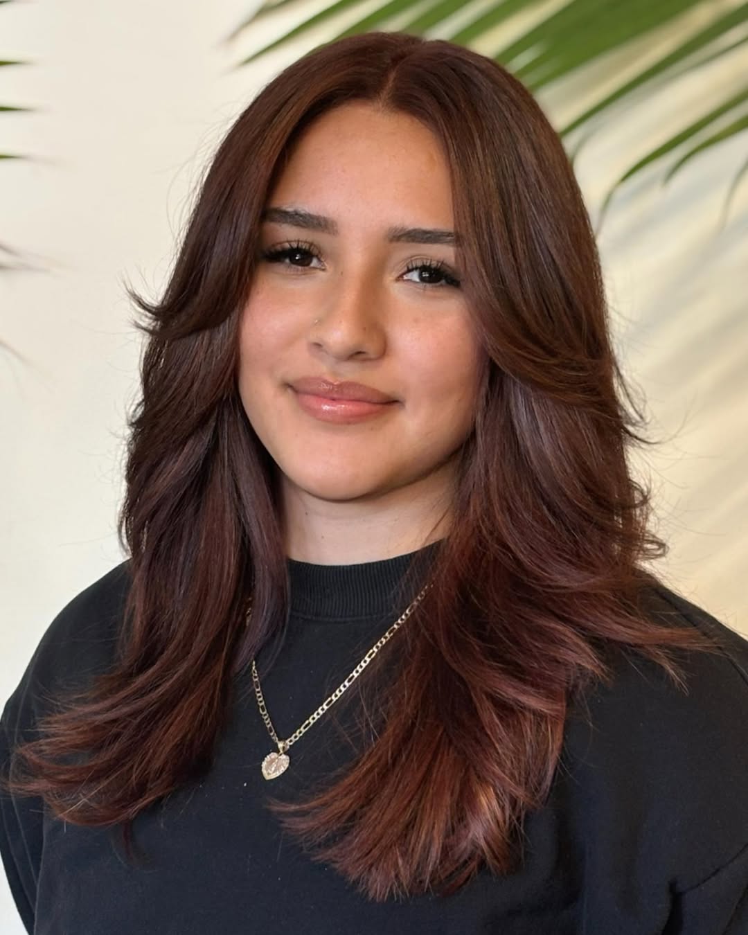 dark brown red hair with curtain bangs