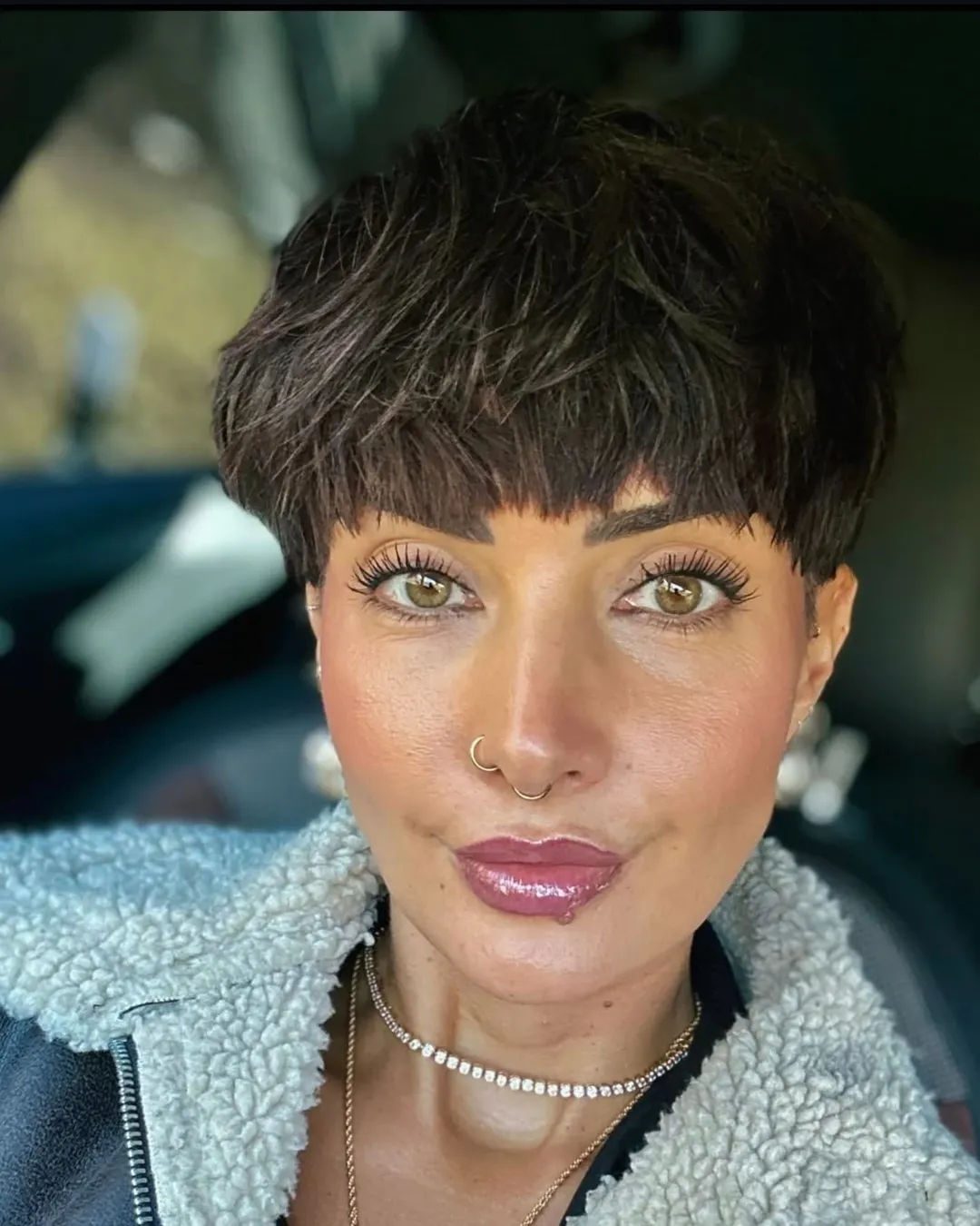 layered pixie haircut with choppy bangs