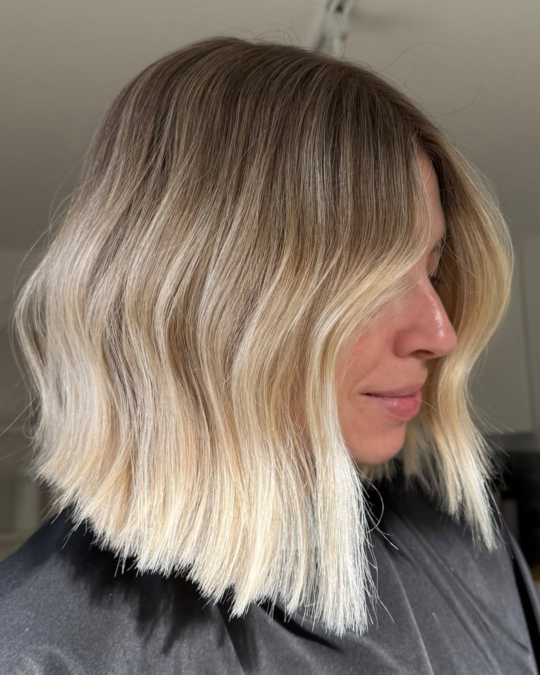 low-maintenance honey blonde angled bob
