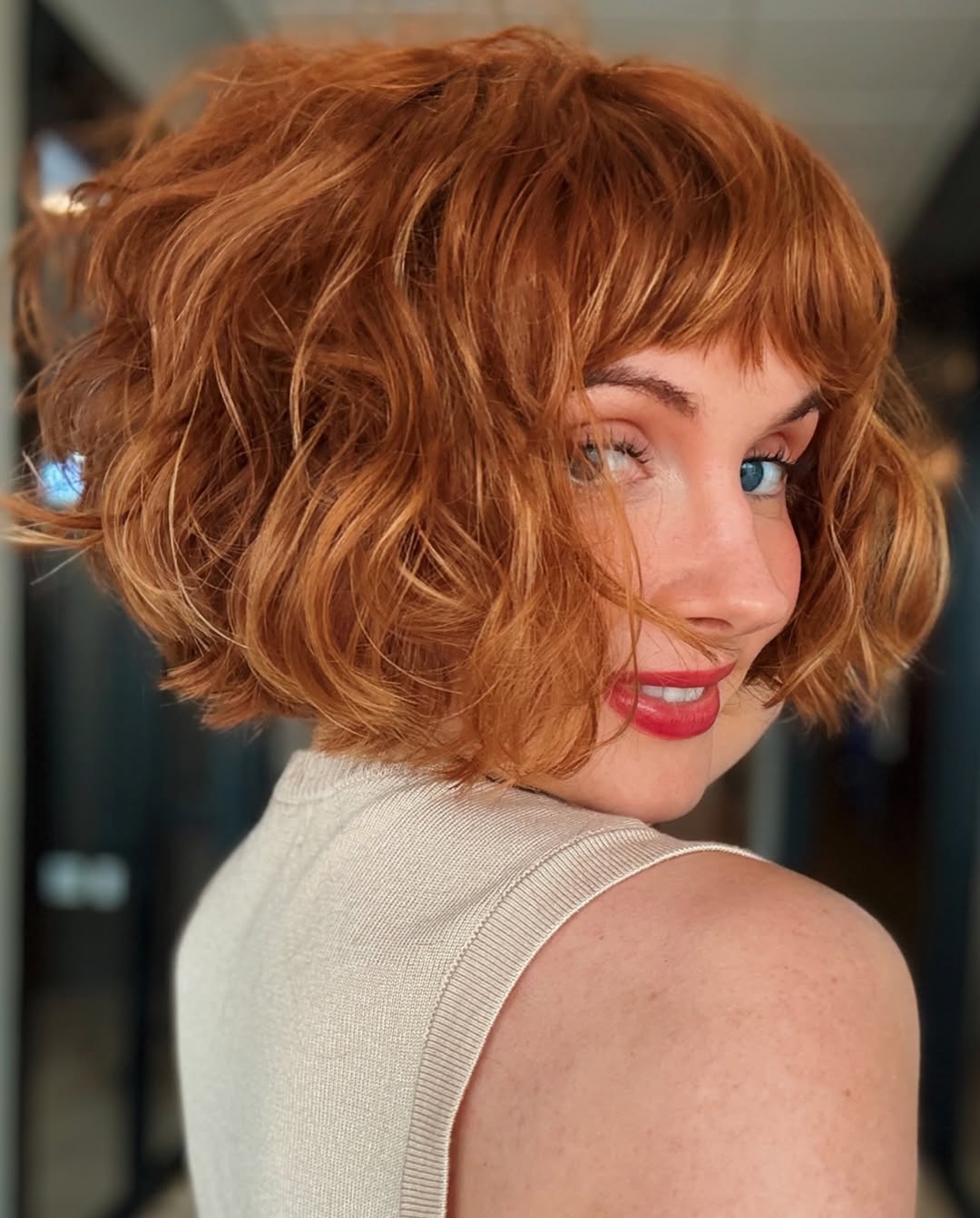 copper French bob with micro bangs