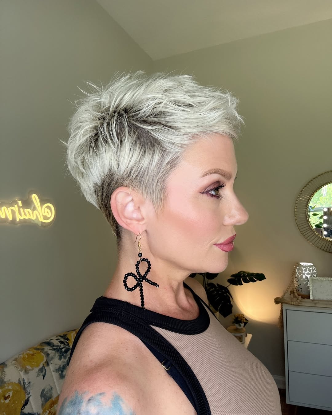 messy pixie haircut with an undercut