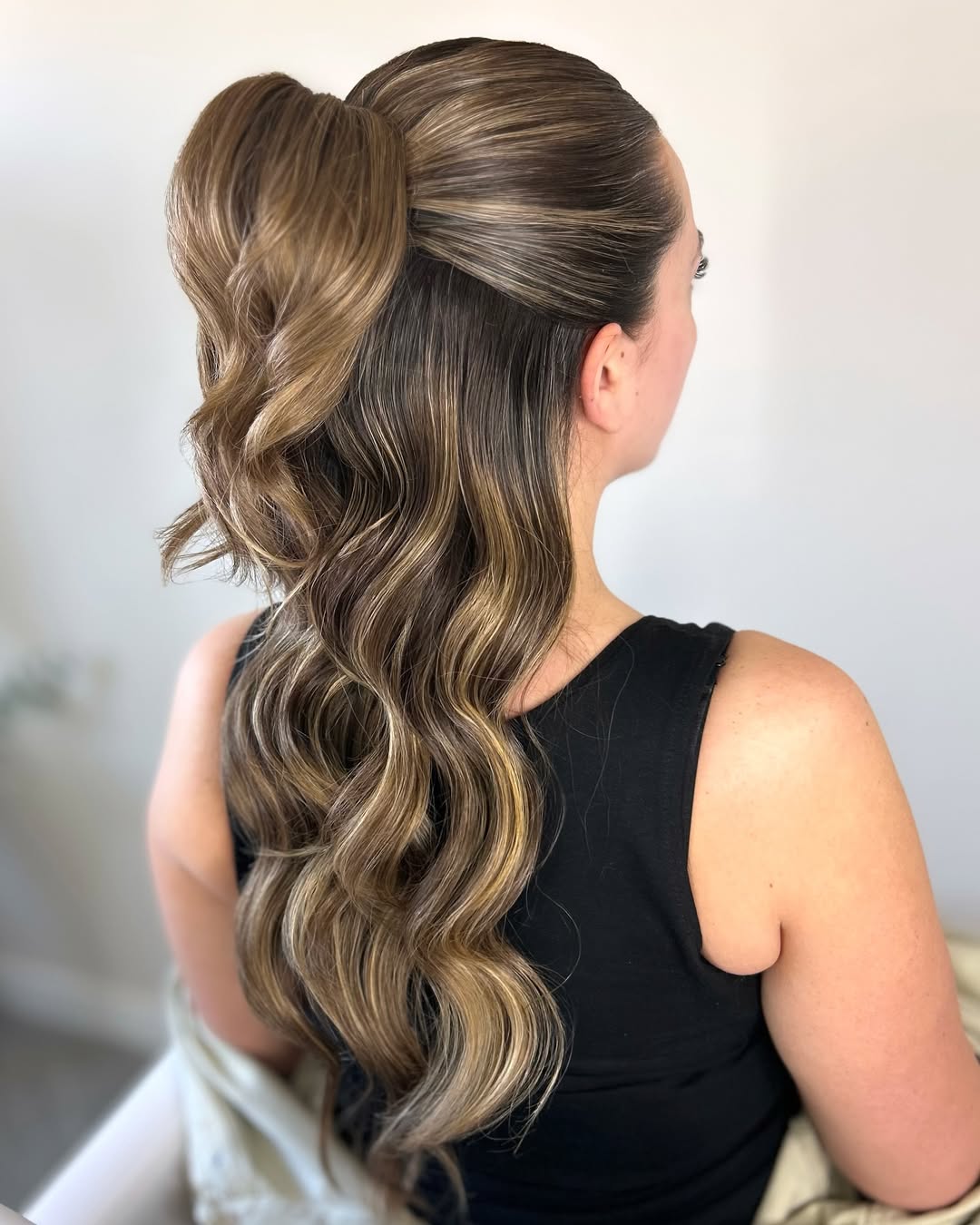 dimensional half up half down ponytail style