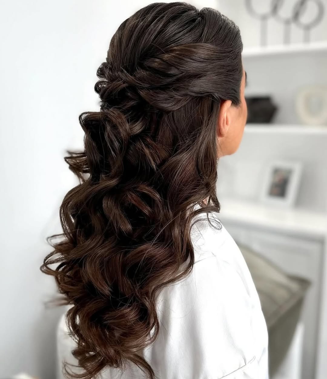 glam twisted wavy half updo
