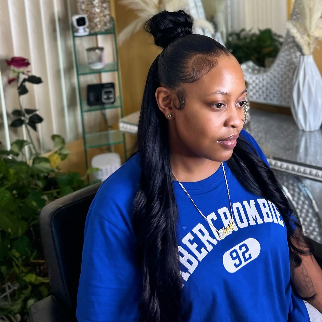 sleek half up bun hairstyle