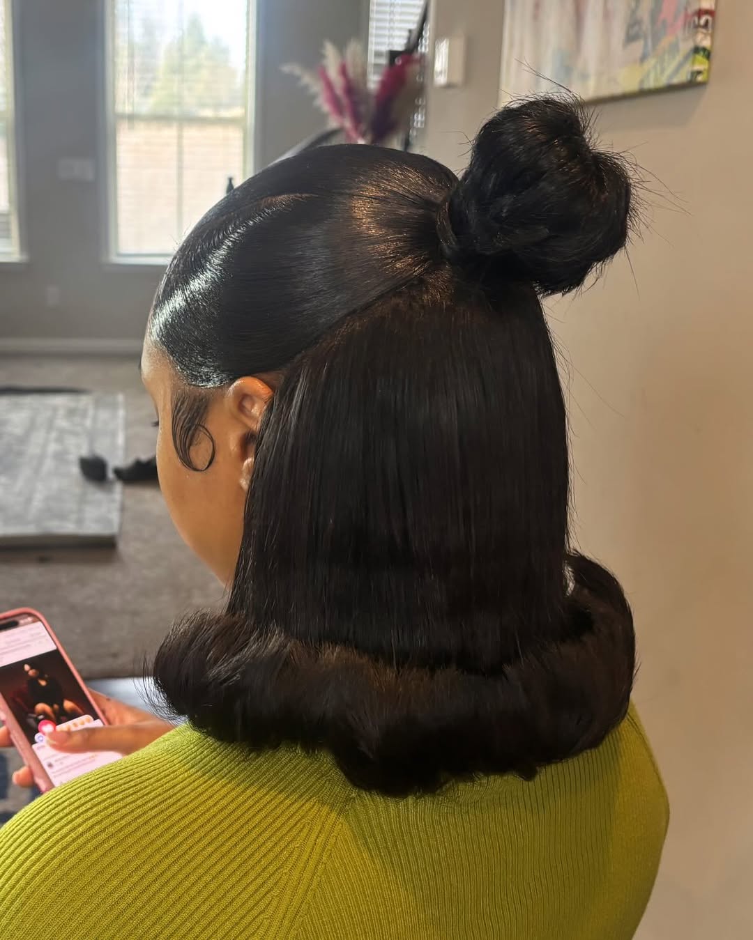 sleek half up bun with flips