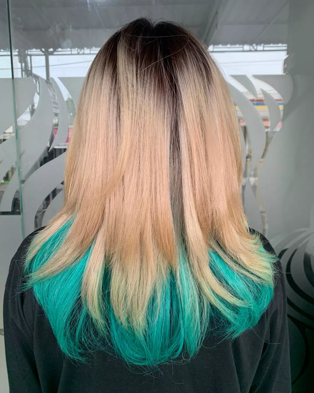 medium length hair with layers and peekaboo highlights
