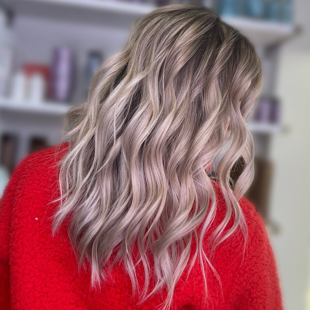 wavy layered low-maintenance medium length hairstyle