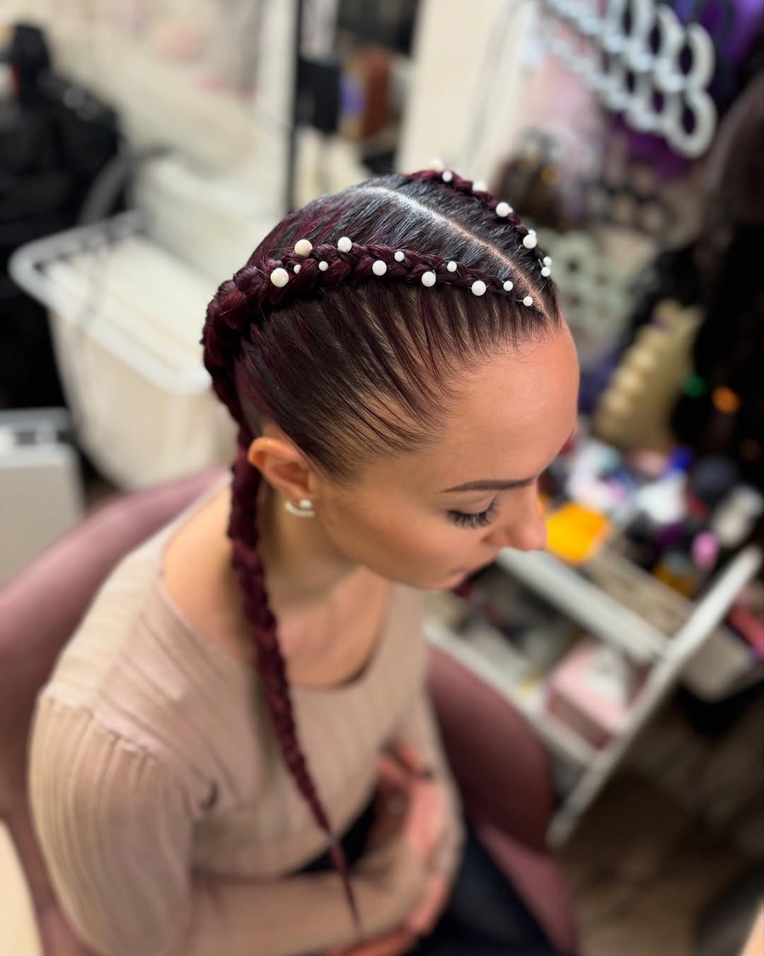Dutch-braided pigtails with pearls