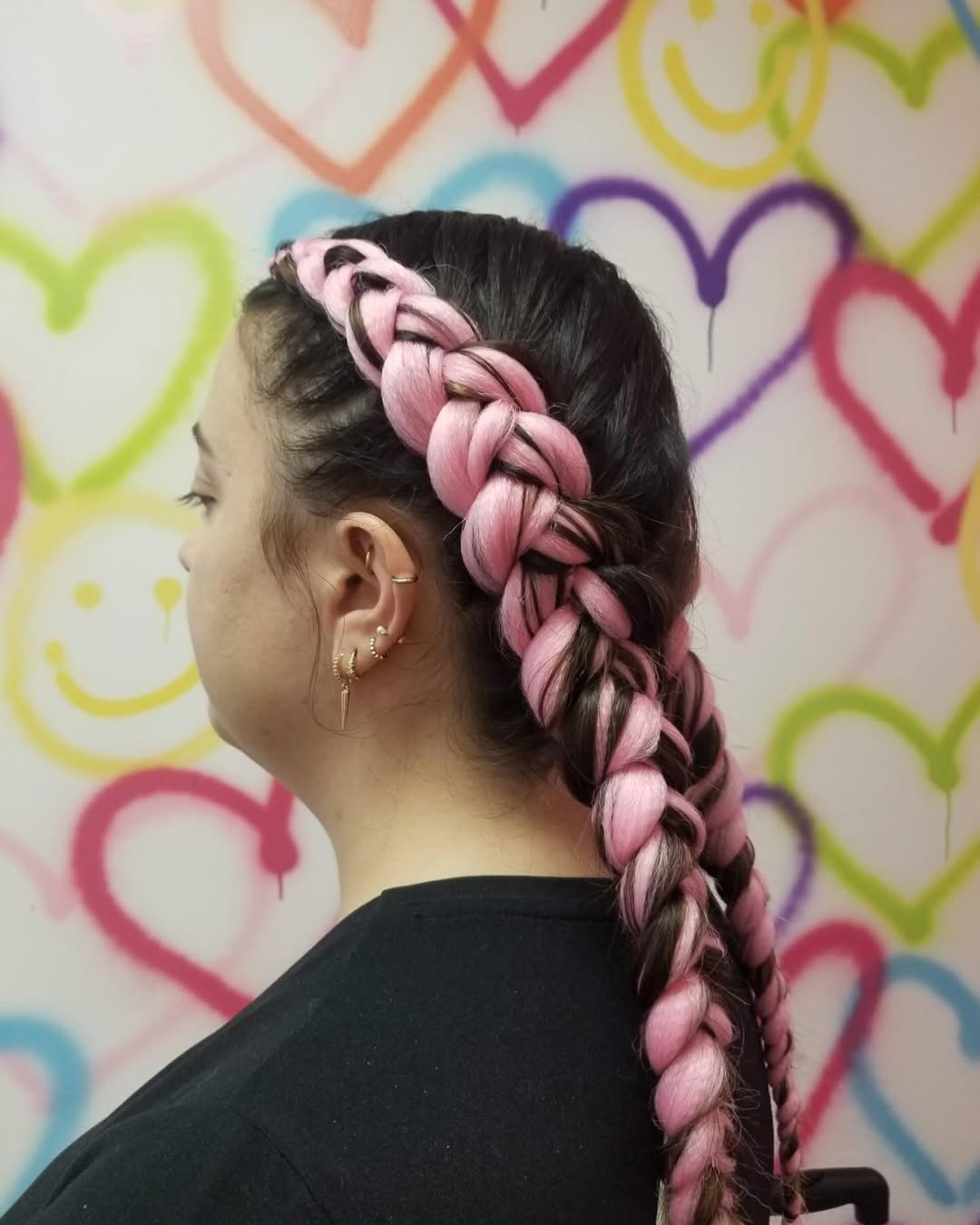 Dutch-braided pigtails with synthetic hair