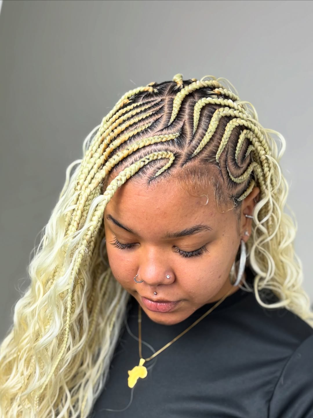 blonde Fulani lemonade braids with curls