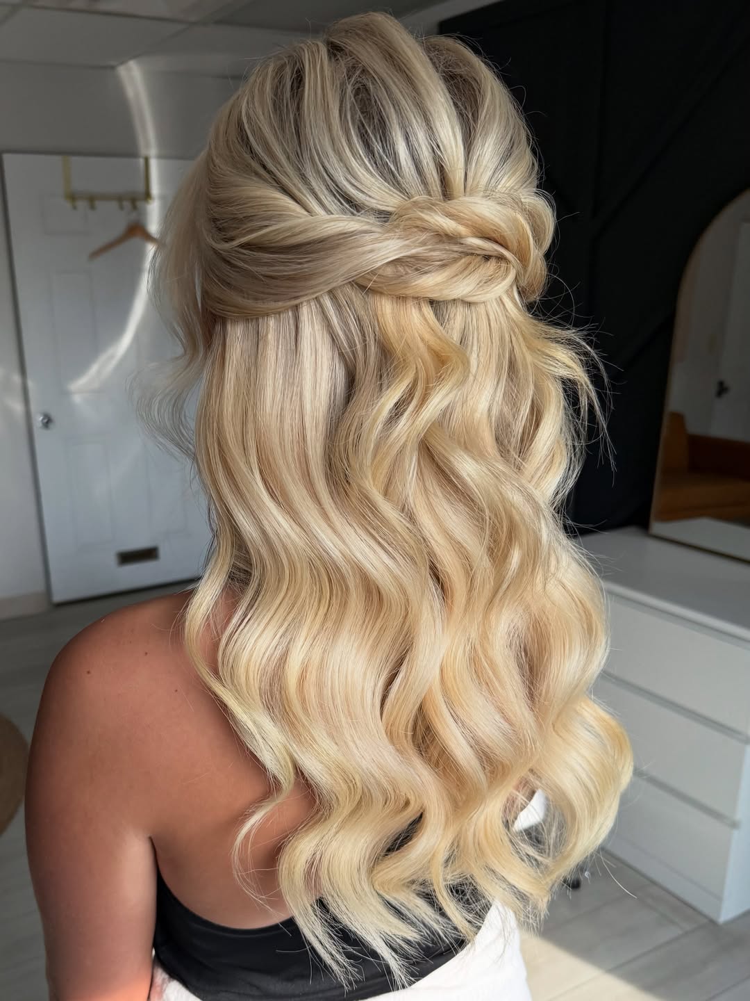 wavy twisted half-up half-down style