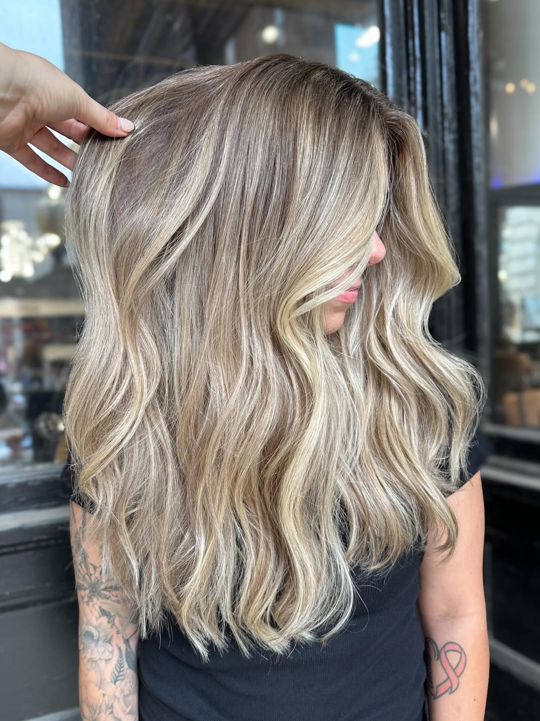 beige blonde balayage highlights on brown hair