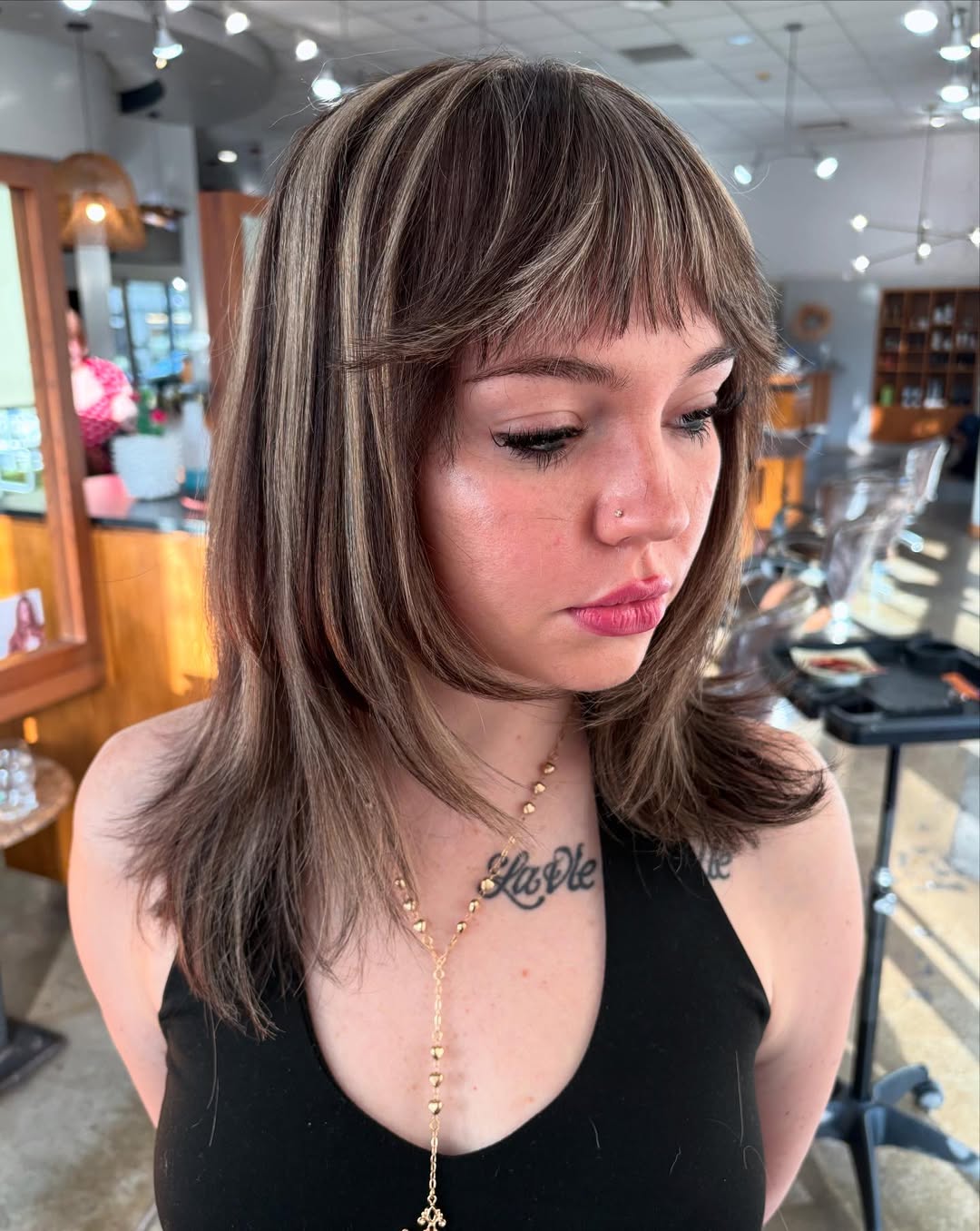 chunky beige blonde highlights on brown hair