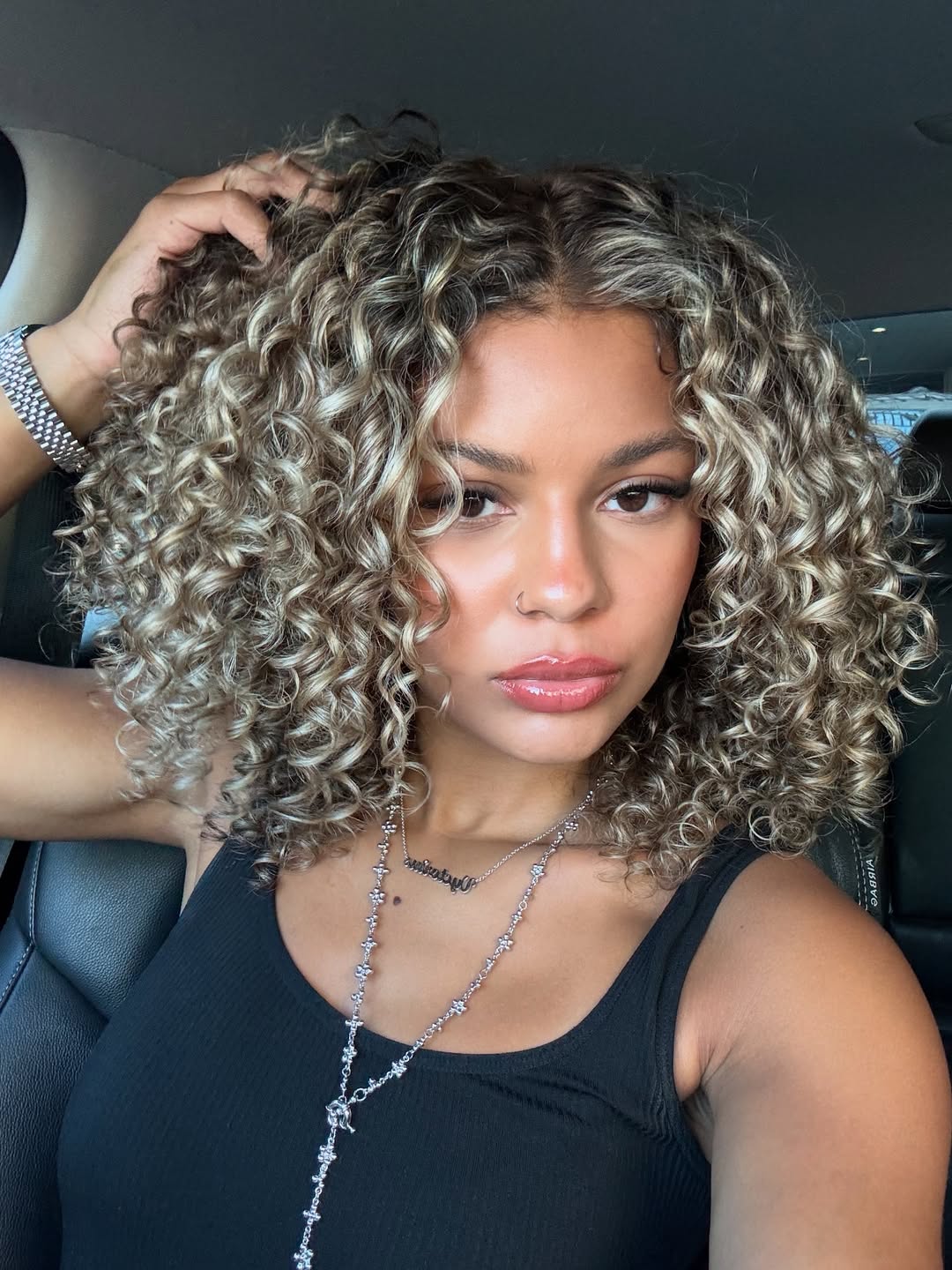 curly brown hair with highlights