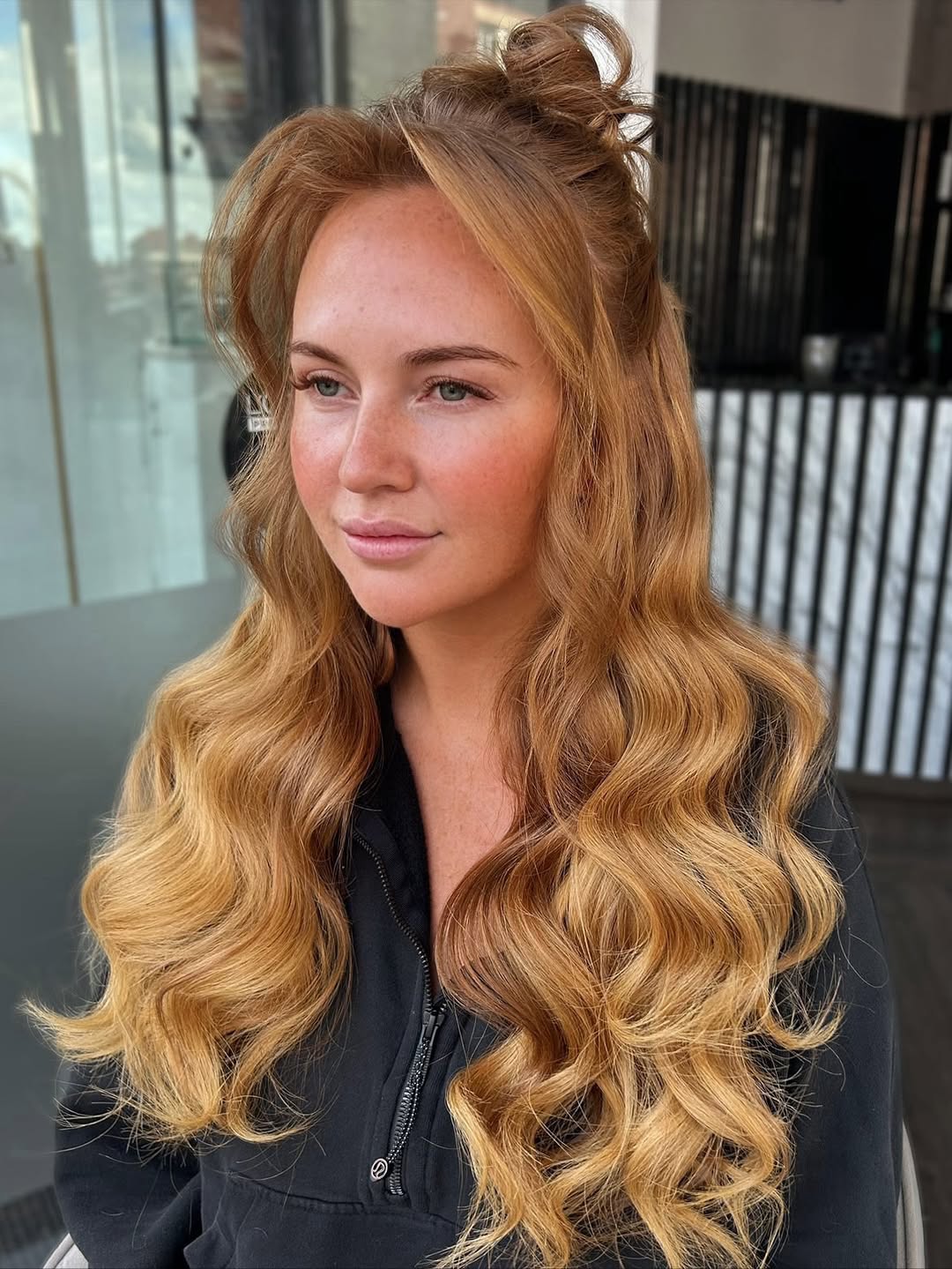 half-up bun with elegant waves