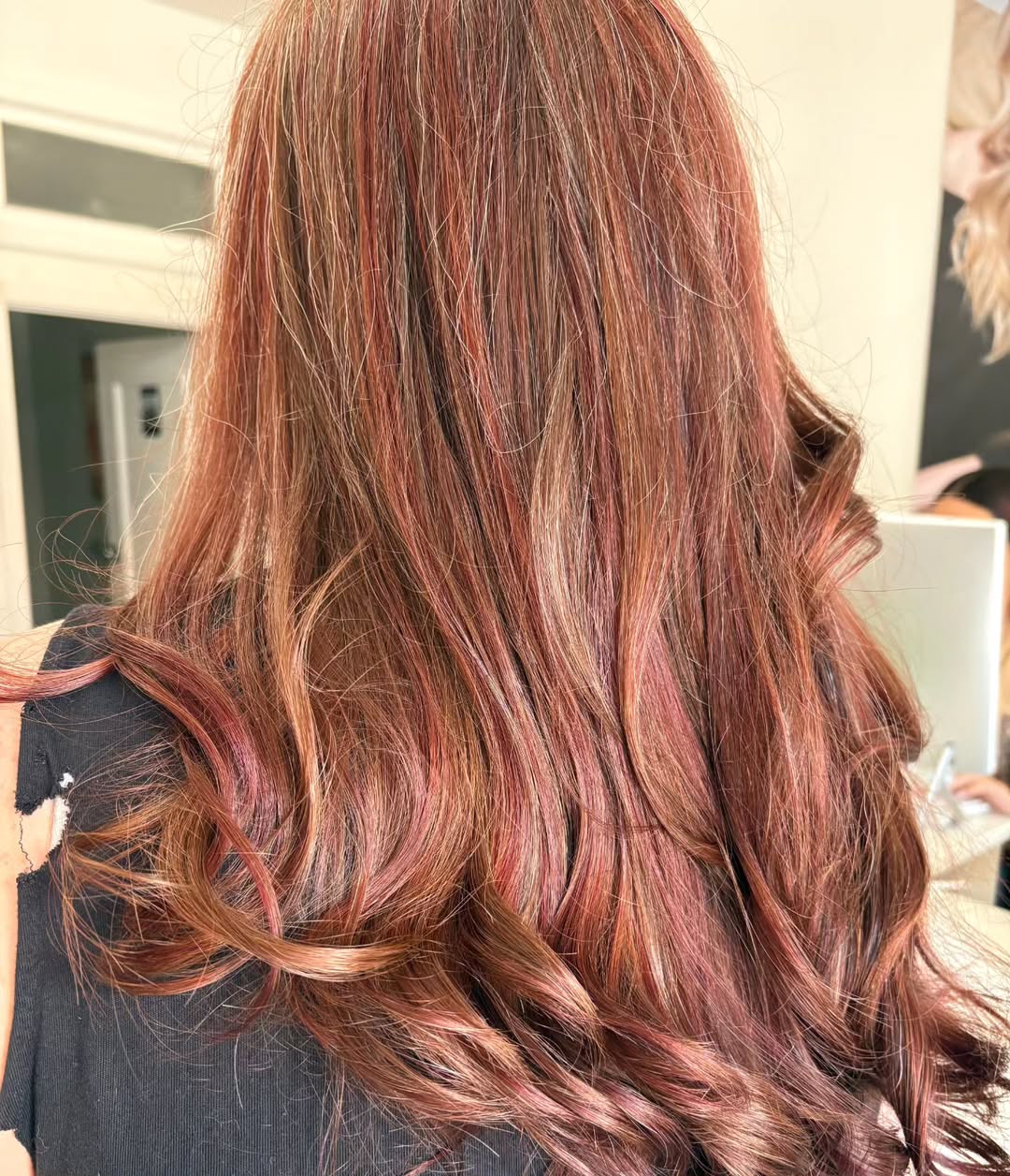 light brown hair with red highlights