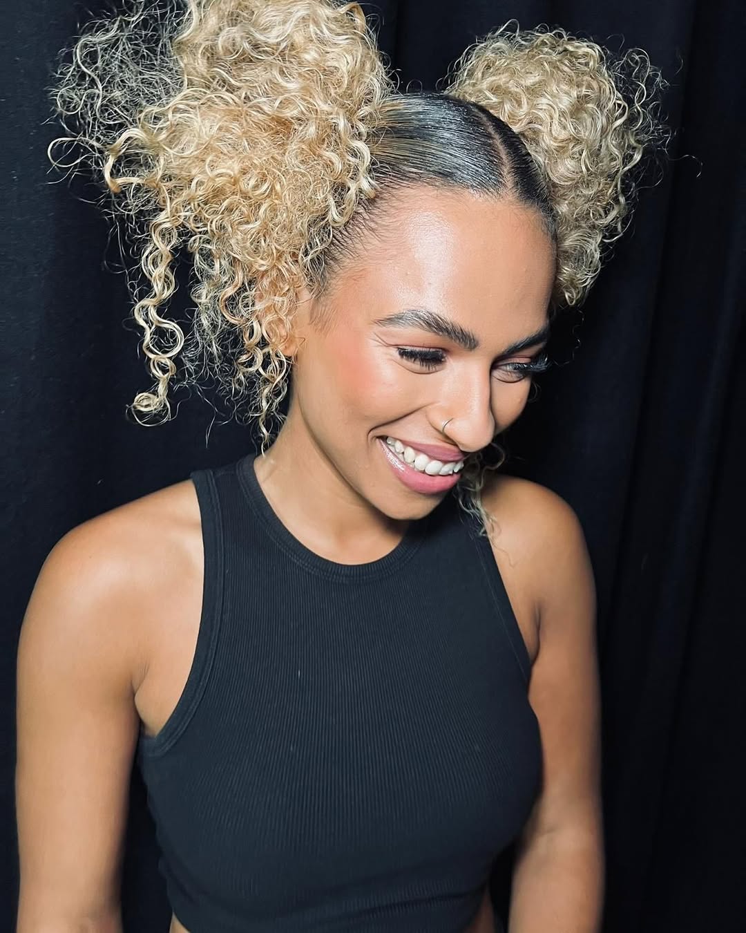 sleek and curly space buns