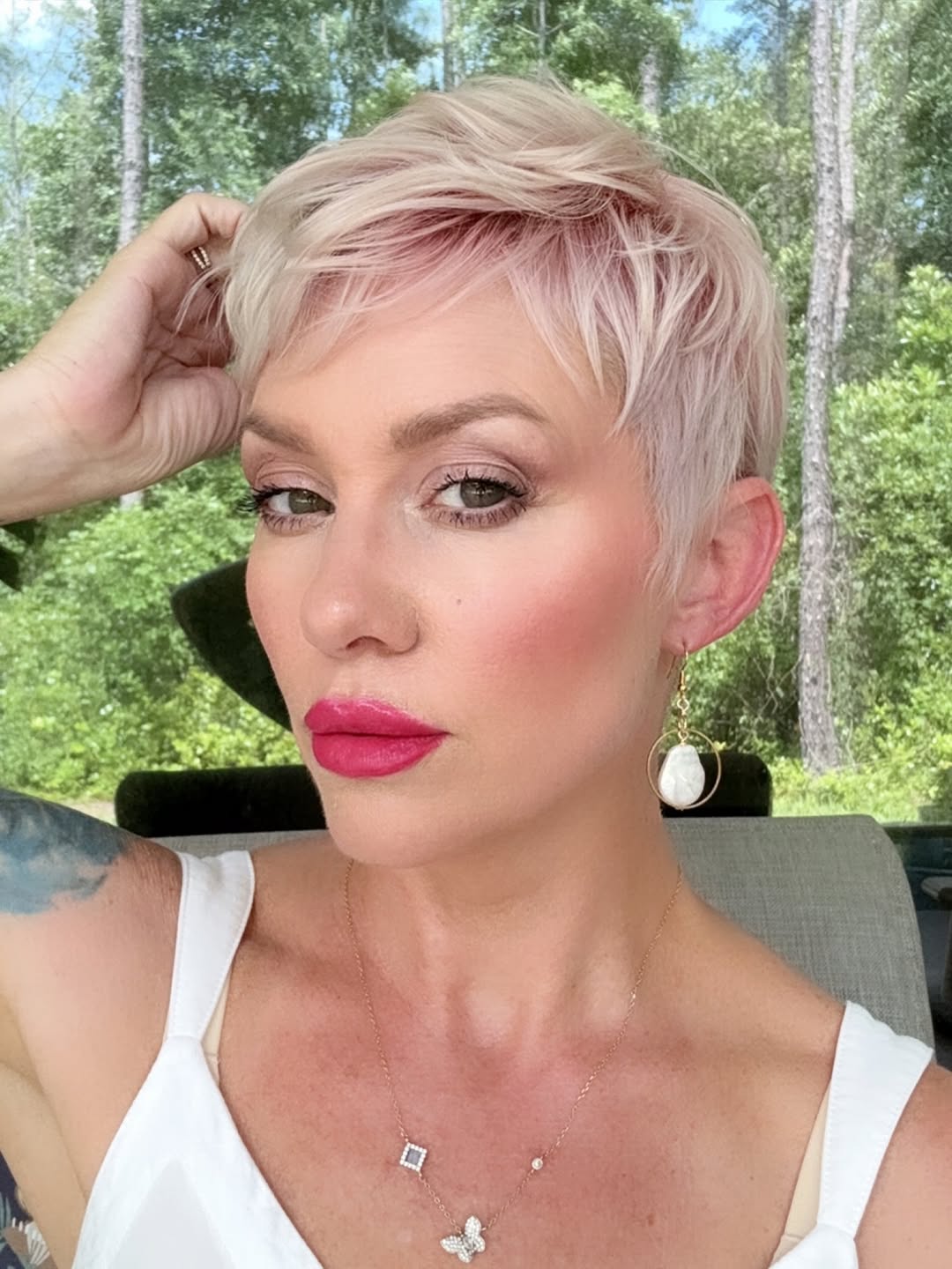pastel pink very short pixie haircut