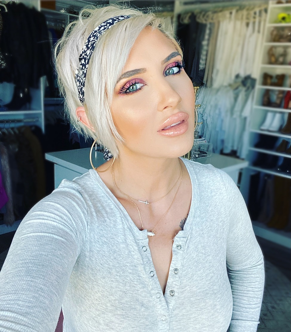 blonde pixie cut with a headband