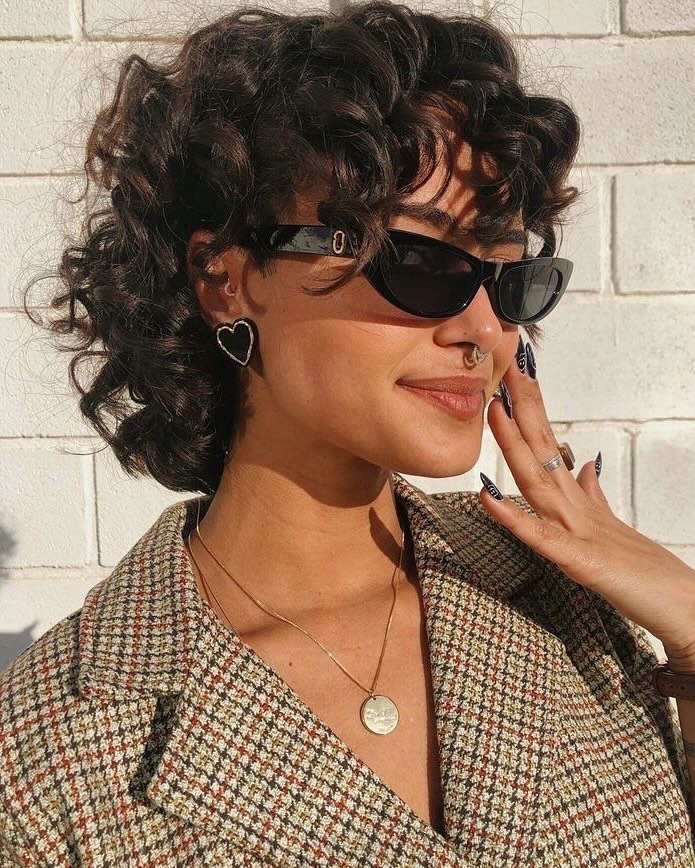 curly pixie cut with bangs