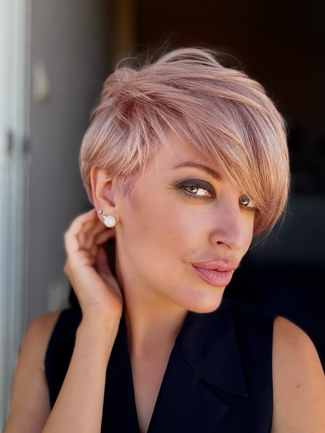 pastel pink asymmetrical pixie cut