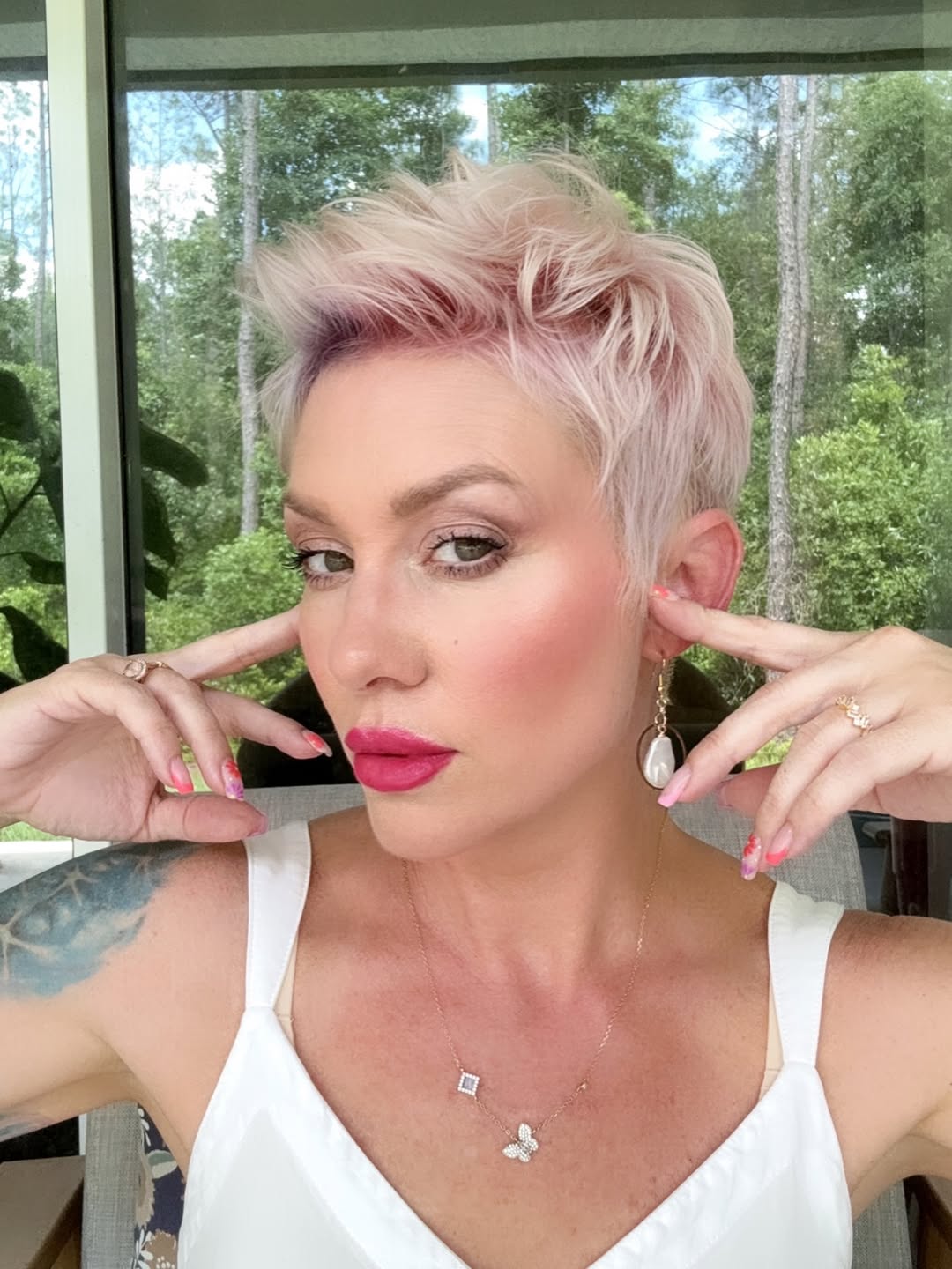 pastel pink messy pixie haircut