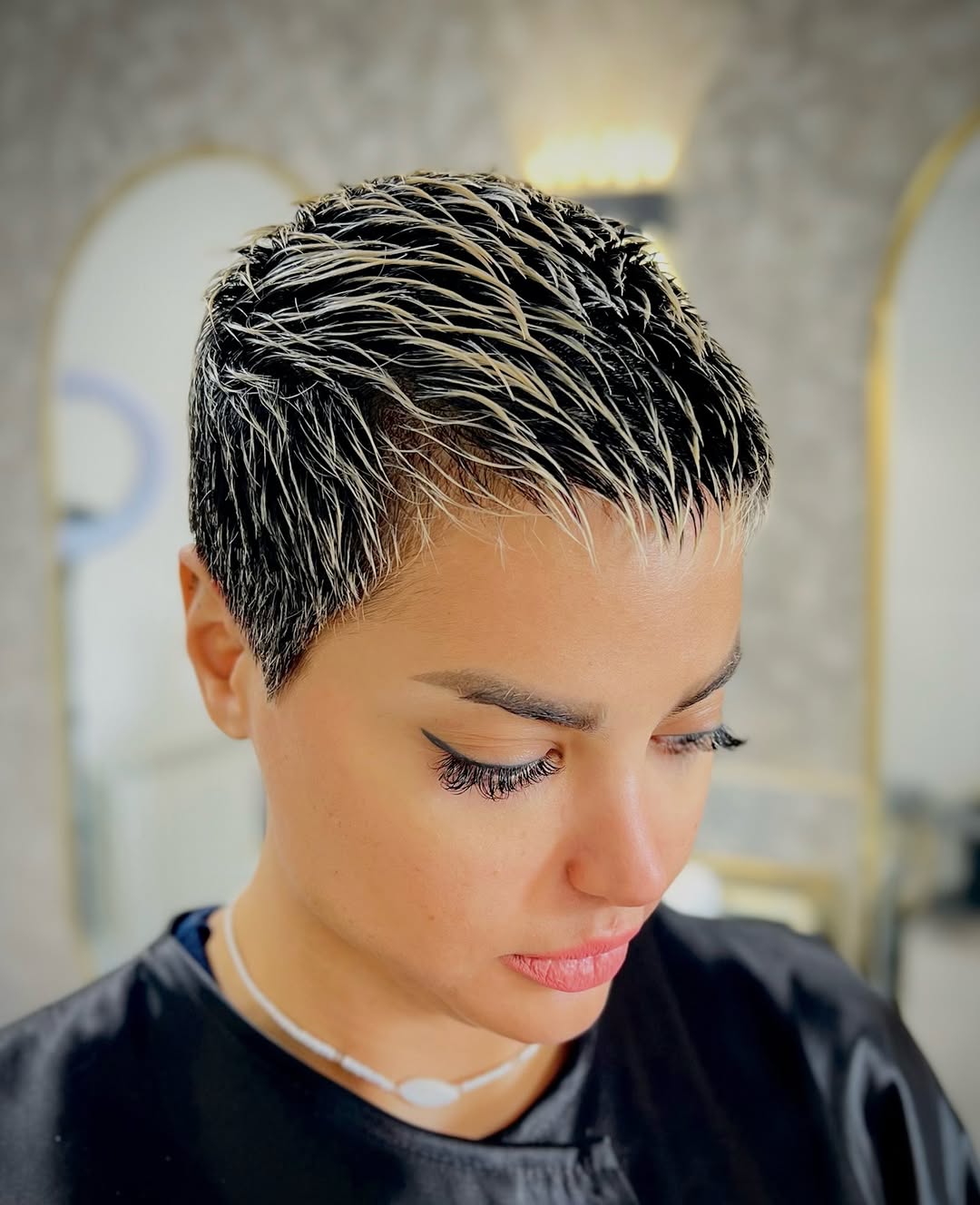 textured messy pixie cut with highlights